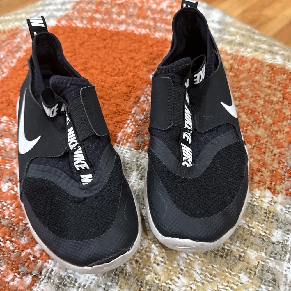 Nike Kids Black Slip-On Sneakers with White Swoosh